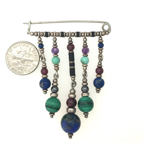 Brooch of Many Stones.