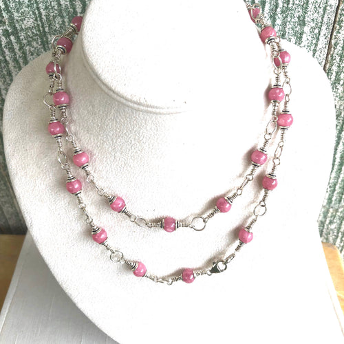 Rhodochrosite and Sterling Silver 34 inch long necklace.