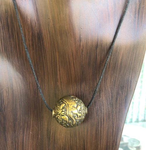 Vintage Dragon Bead on Cord with two Sliding Knots
