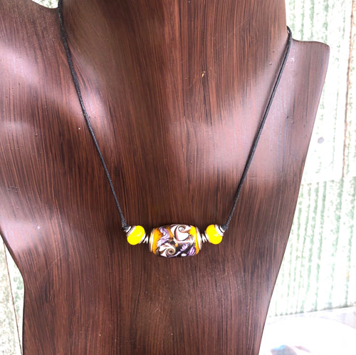 Lamp work Necklace in Yellow with Stars and Shells on Two knot Cord  KateDW