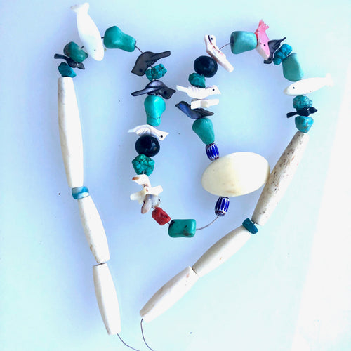 Historic elements in Destash Turquoise Carved Birds and Fish.