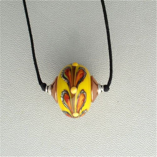 Lampwork Glass Bead in Yellow and Orange With Copper on Cord.