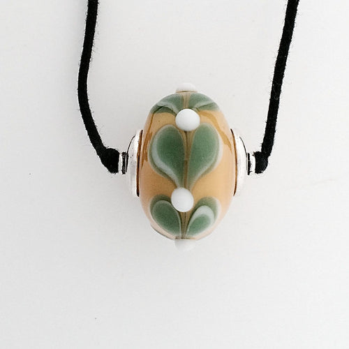 Lamp Work Single Bead in Yellow with Leaf Design on Two Knot Cord