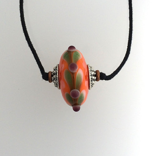 Lamp Work Single Bead In Orange with Green Leaves and  Amethyst Dots on Two Knot Cord